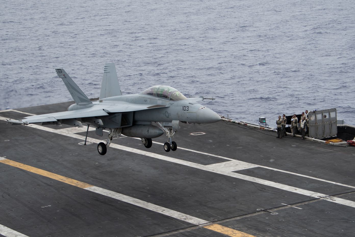 F/A-18F Super Hornet landing on an aircraft carrier in the Pacific Ocean