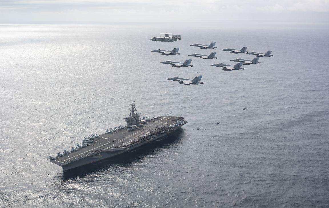 Carrier Air Wing 11 flying over USS Theodore Roosevelt in an air power demo in the Gulf of Alaska