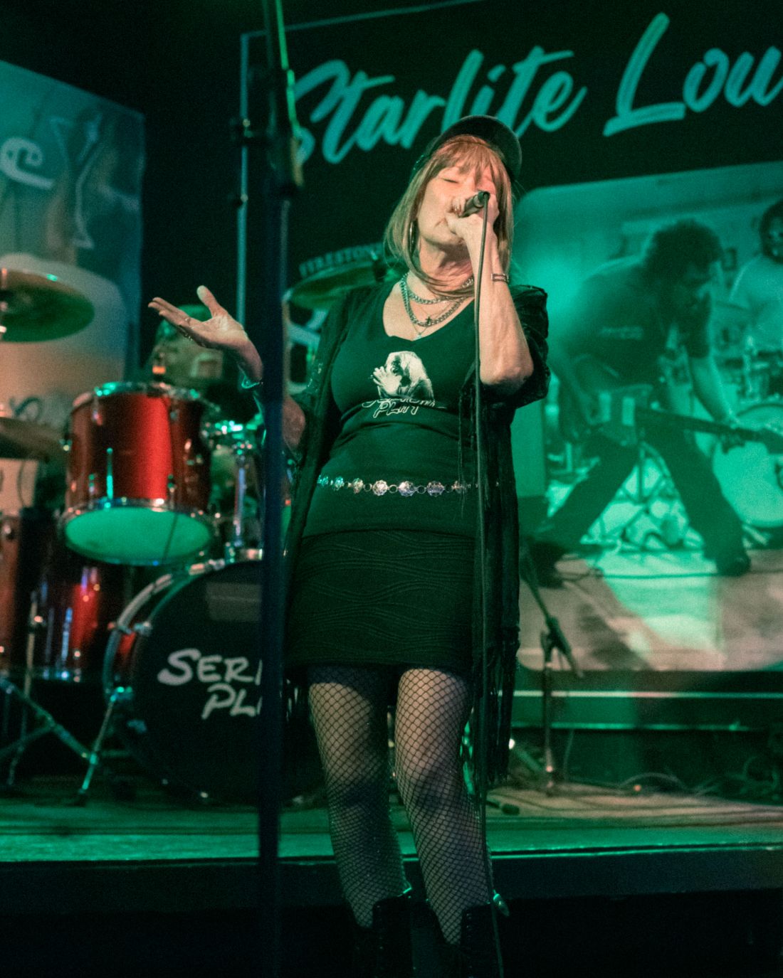 Lori from Serious Play singing rock music at Starlite Lounge in Glendale, AZ